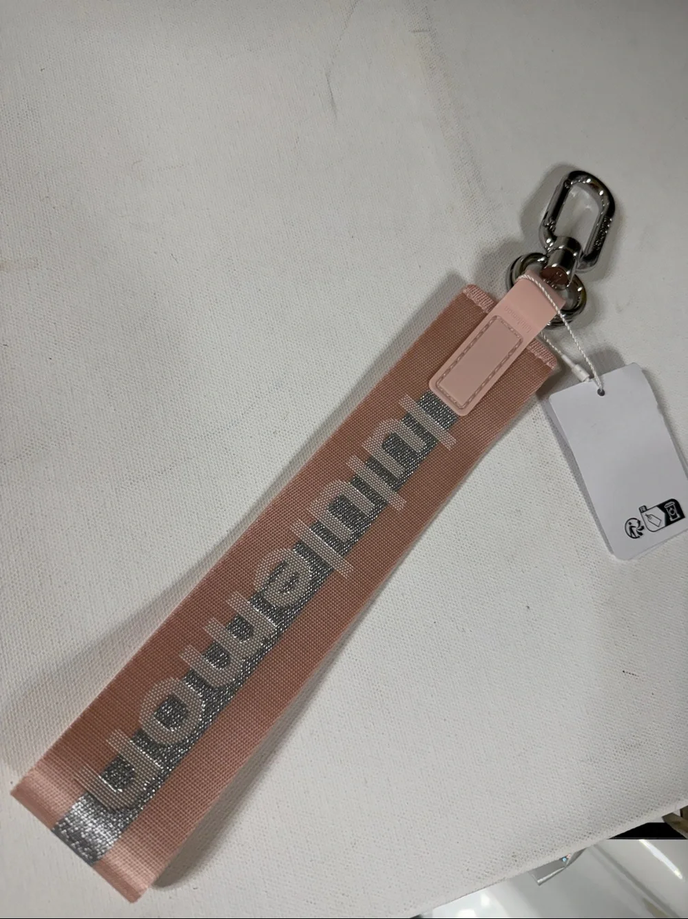 Lululemon Athletica Never lost Keychain . NEW with tags